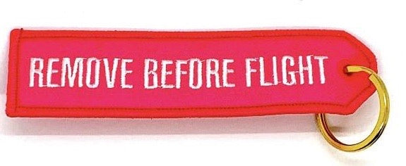 REMOVE BEFORE FLIGHT Pink Keyring